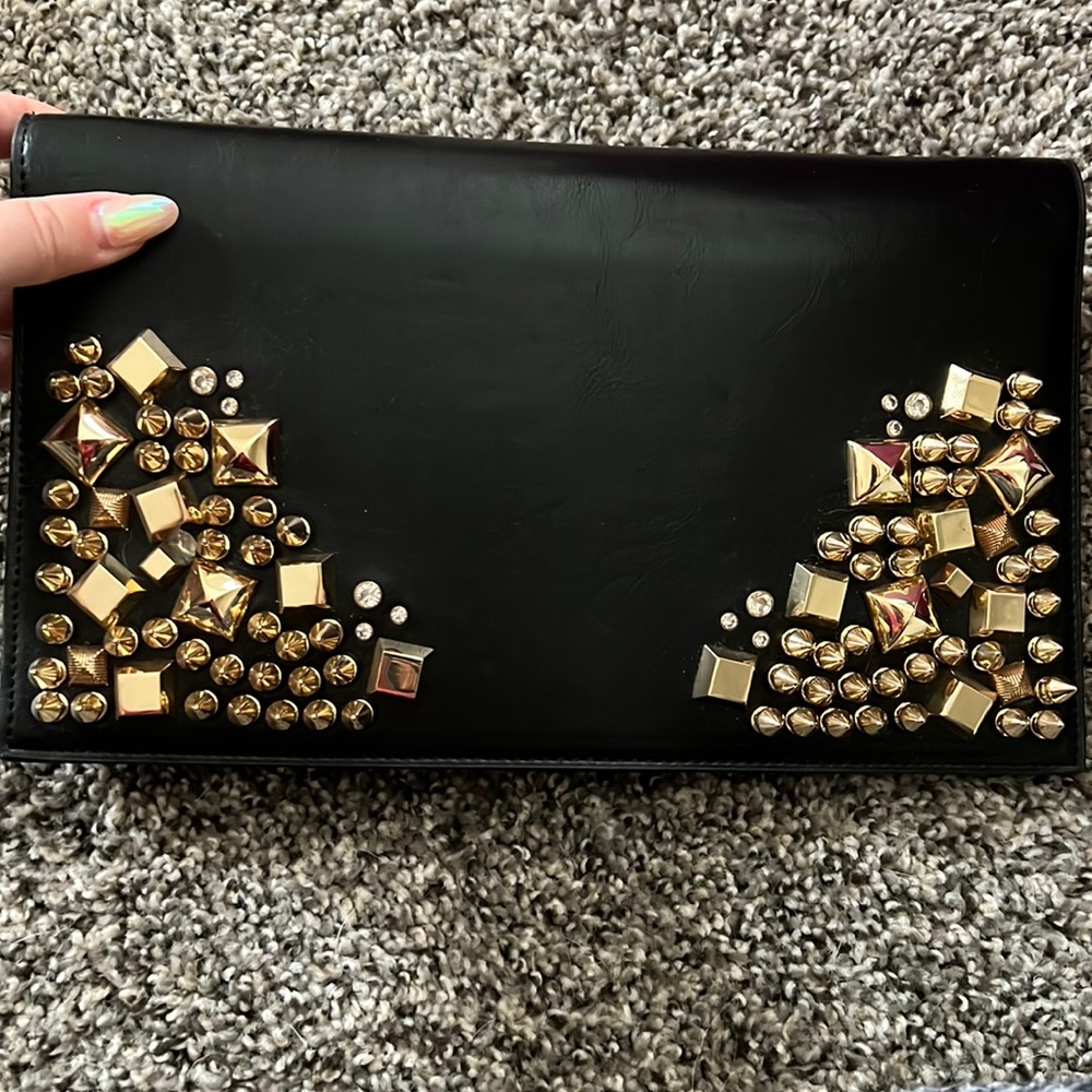 BEBE black leather crossbody/clutch